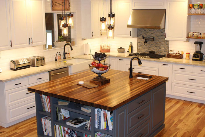 rustic walnut kitchen island butcher block countertop with everlast varnish finish by armani fine woodworking