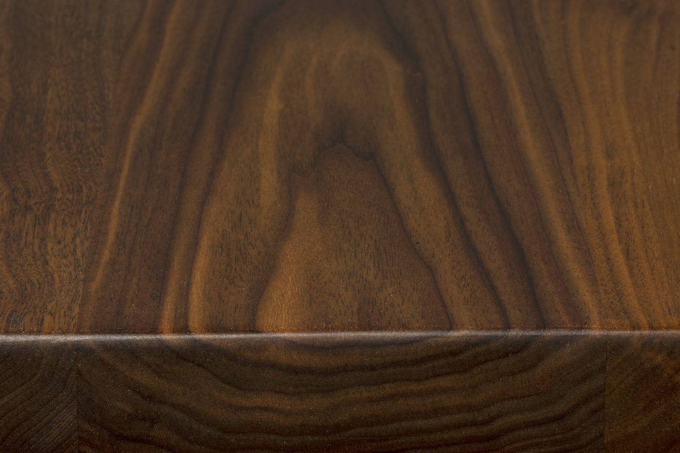 Premium walnut face grain surface showing wider heartwood boards and natural grain movement