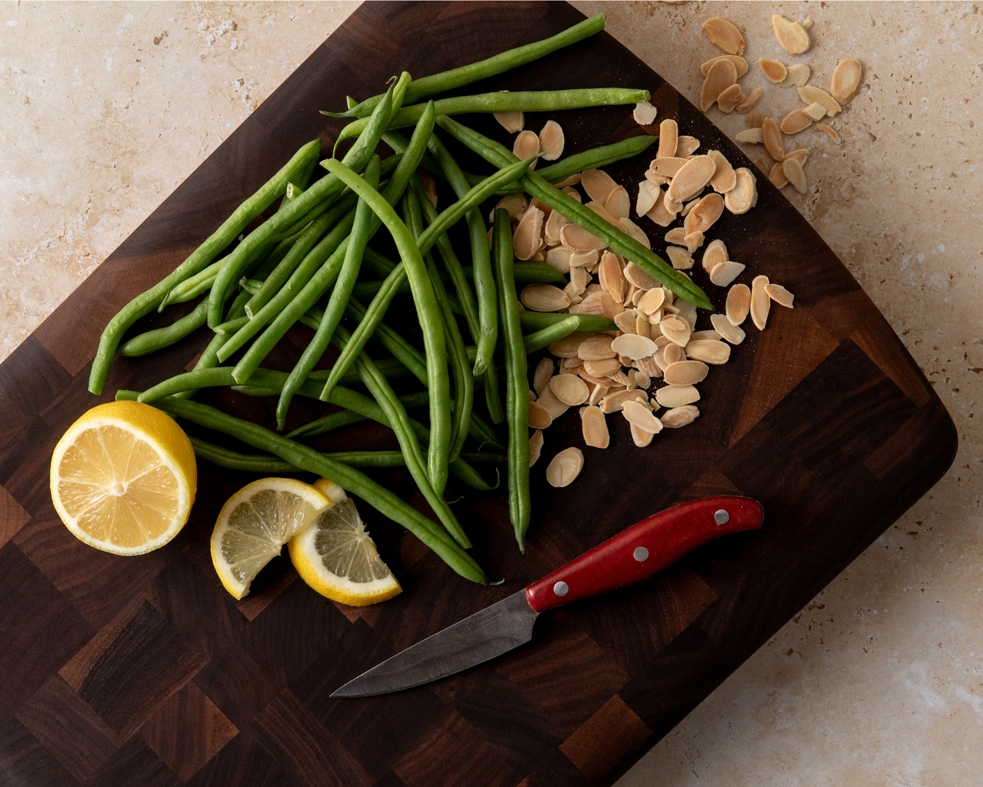 Artisan end grain cutting and serving board with food preparation