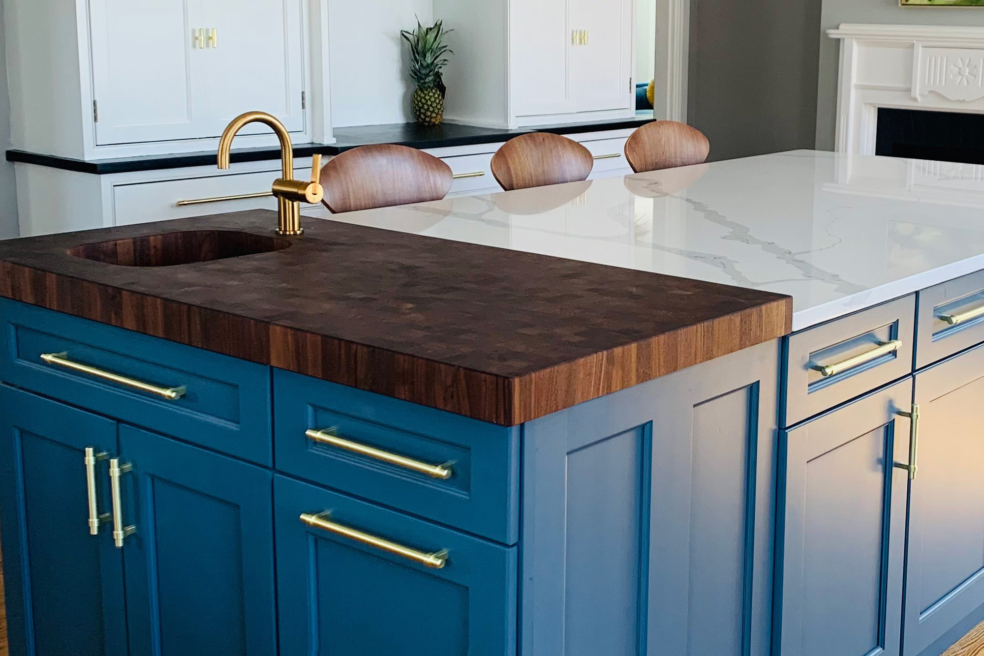 Walnut end grain hardwood island countertop with integrated waterfall edge