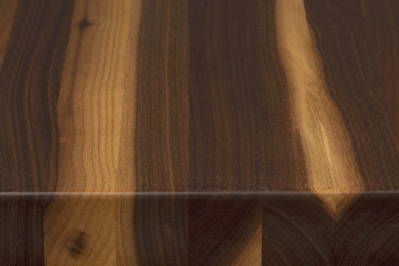 Rustic walnut edge grain surface showing heartwood and sapwood variation