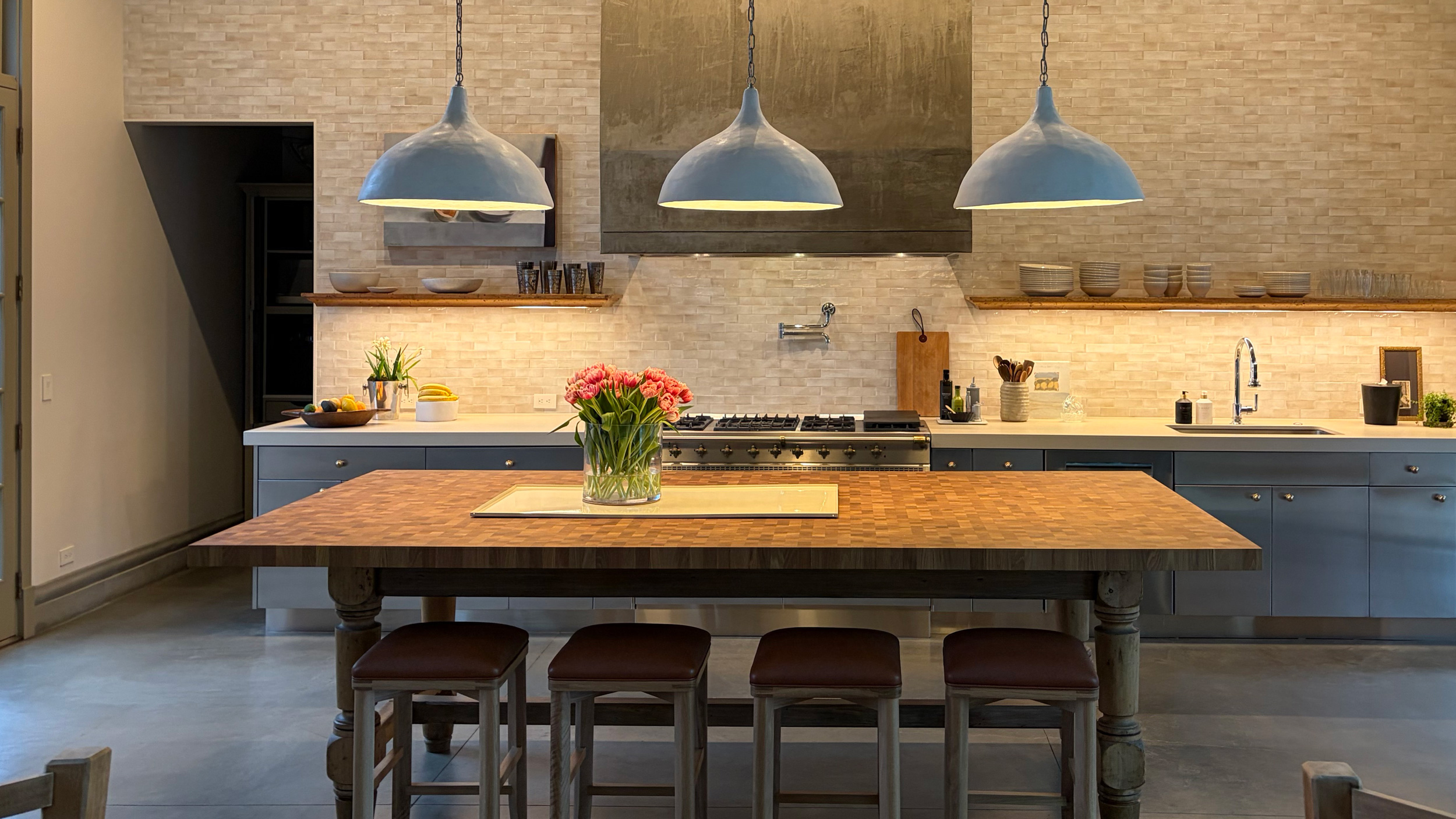 Custom end grain white oak kitchen island in chef-driven residential kitchen