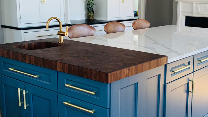 Walnut end grain hardwood island countertop with integrated waterfall edge